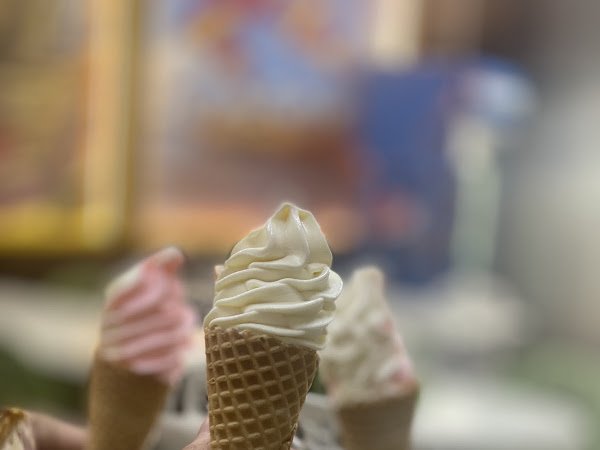 Ice Cream Cone, vanilla in front with two strawberry cones behind, from a diner's Google review photo