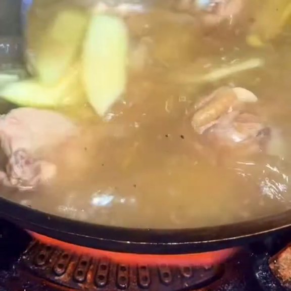 Chicken tinola simmering with green papaya wedges in a clear broth at Pinoy Tambayan