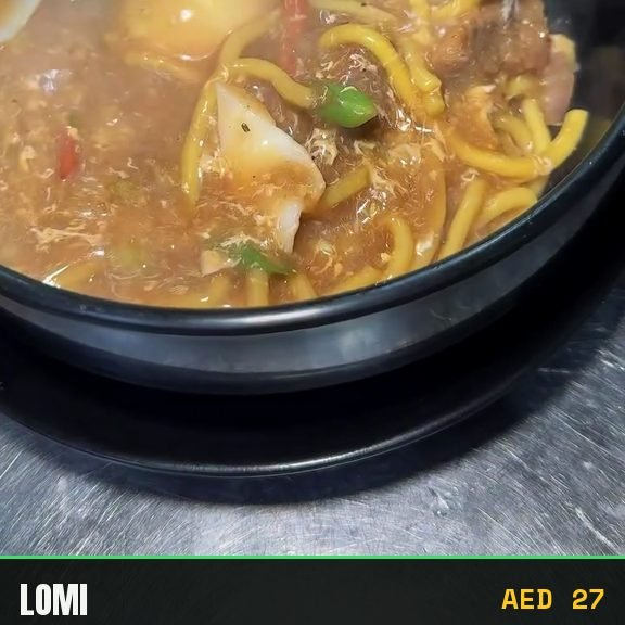 Lomi, yellow noodles cooked into a thick broth