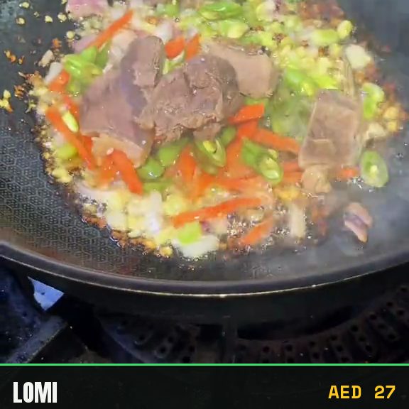 Cooking finished in the wok at Pinoy Tambayan in Al Barsha