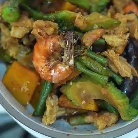Pinakbet of okra, long beans and squash with a prawn on top, served at Pinoy Tambayan