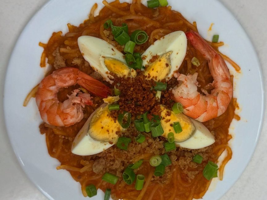 Pancit malabon plated at Pinoy Tambayan in Al Barsha